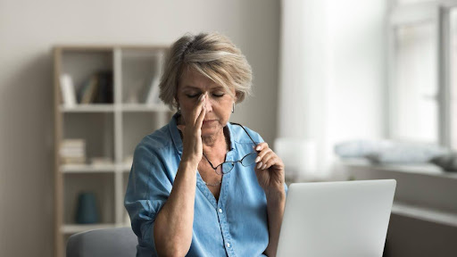 Mature woman experiencing fatigue